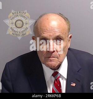 Undated handout photo issued by Fulton County Sheriff's Office of the booking photo of Rudolph Giuliani after he surrendered and was booked at the Fulton County Jail in Atlanta. Former US President Donald Trump and 17 others, who are accused by Fulton County District Attorney Fani Willis of scheming to subvert the will of Georgia voters to keep the Republican president in the White House after he lost to Democrat Joe Biden. Issue date: Friday August 25, 2023. Stock Photo