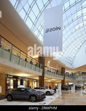 Vehicle display in shopping mall. 360 Mall, Kuweit City, Kuwait. Architect: CRTKL, 2021. Stock Photo