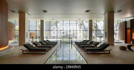 Spa with view through to garden. 360 Mall, Kuweit City, Kuwait. Architect: CRTKL, 2021. Stock Photo