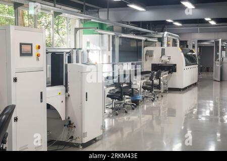 production line for printed circuit board, automatic chip mounter Stock Photo