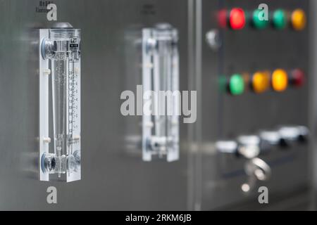 Perm, Russia - June 29, 2023: water gauge and colored indicators on the control panel of the cleaning machine for printed circuit boards Stock Photo