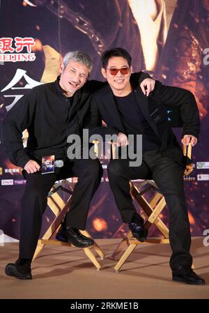 Image of Martial-arts expert and actor Jet Li poses for photographers as