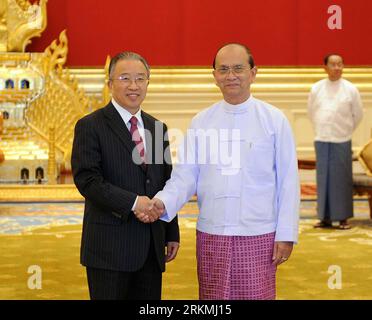 Myanmar president thein sein hands hi-res stock photography