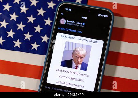 Japan. 25th Aug, 2023. In this photo illustration, Donald J. Trump came back to X formerly known as Twitter to post his mugshot from in a xeet/tweet. Donald J. Trump posted his mugshot on his X account in defiance of his arrest in Atlanta, Georgia and to rally his supporters behind him in his bid for re-election as US President. (Credit Image: © Stanislav Kogiku/SOPA Images via ZUMA Press Wire) EDITORIAL USAGE ONLY! Not for Commercial USAGE! Credit: ZUMA Press, Inc./Alamy Live News Stock Photo