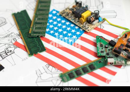 The flag of the United States of America on the CPU processor or GPU chip on the motherboard. America is the world's largest producer of chips Stock Photo