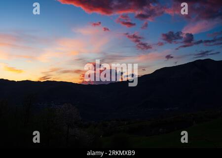 Attractive colorful sunset with cloudy sky in rural area of Reggio Emilia, Italy Stock Photo