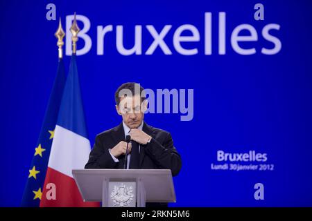 Bildnummer: 56988147  Datum: 30.01.2012  Copyright: imago/Xinhua (120131) -- BRUSSELS, Jan. 31, 2012 (Xinhua) -- French President Nicolas Sarkozy attends a press conference after EU s informal summit at EU headquarters in Brussels, capital of Belgium, Jan 30, 2012. All EU member states except Britain and the Czech Republic would join and sign a new fiscal treaty designed to enshrine tighter deficit and debt discipline, European Council President Herman Van Rompuy said here late on Monday. (Xinhua/Thierry Monasse)(yt) BELGIUM-EU-SUMMIT PUBLICATIONxNOTxINxCHN People Politik xda x0x premiumd Port Stock Photo