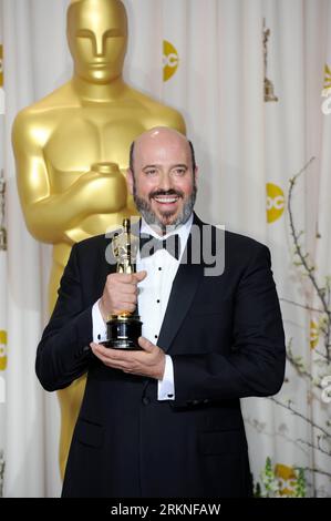 Bildnummer: 57111166  Datum: 26.02.2012  Copyright: imago/Xinhua (120227) -- HOLLYWOOD, Feb. 26, 2012 (Xinhua) -- Winner for Best Costume Design for The Artist , Mark Bridges poses with his trophy at the backstage of the 84th Annual Academy Awards in Hollywood, California, the United States, Feb. 26, 2012. (Xinhua/Yang Lei)(msq) U.S.-HOLLYWOOD-OSCARS-WINNERS PUBLICATIONxNOTxINxCHN Kultur Entertainment People Film 84. Annual Academy Awards Oscar Oscars Hollywood Preisträger premiumd xsp x0x 2012 hoch Highlight     57111166 Date 26 02 2012 Copyright Imago XINHUA  Hollywood Feb 26 2012 XINHUA Win Stock Photo