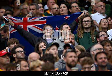 Twickenham, United Kingdom. 25th Aug, 2023. New Zealand V South Africa 2023 Rugby World Cup warm up match for the Qatar Airways Cup. Twickenham Stadium. Twickenham. A New Zealand fan holds up their flag as she sings the national anthem during the New Zealand V South Africa 2023 Rugby World Cup warm up match for the Qatar Airways Cup. Credit: Sport In Pictures/Alamy Live News Stock Photo