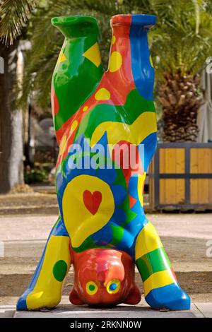 colourful bear doing a headstand, Artwork Buddy Baer in front of the Kurpark, Germany, North Rhine-Westphalia, Bad Pyrmont Stock Photo