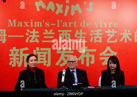 Bildnummer: 57698386  Datum: 27.03.2012  Copyright: imago/Xinhua (120327) -- HEFEI, March 27, 2012 (Xinhua) -- Renowned fashion designer Pierre Cardin (C) attends a press conference in Hefei, capital of east China s Anhui Province, March 27, 2012. A press conference in the name of Maxim s-l art de vivre was held here on Tuesday, the 90-year-old designer Pierre Cardin introduced his design concepts and inspirations on both Pierre Cardin fashions and Maxim s restaurants. The popular Maxim s opened its 11th branch restaurant in the world here on Tuesday. The restaurant and the Maxim s brand belon Stock Photo