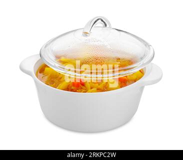 Pot of delicious sauerkraut soup with potatoes and carrot isolated on white Stock Photo