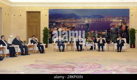 Bildnummer: 58072863  Datum: 05.06.2012  Copyright: imago/Xinhua (120605) -- BEIJING, June 5, 2012 (Xinhua) -- Li Changchun (2nd R), a member of the Standing Committee of the Political Bureau of the Communist Party of China (CPC) Central Committee, meets with heads of the delegations to the 9th meeting that groups culture ministers or representatives from Shanghai Cooperation Organization (SCO) member states, observer states, dialogue partners, the guest state of Afghanistan and the SCO secretariat in Beijing, capital of China, June 5, 2012. (Xinhua/Zhang Duo) (ljh) CHINA-BEIJING-LI CHANGCHUN- Stock Photo