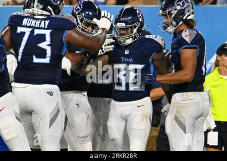 Tennessee Titans running back Julius Chestnut (36) celebrates with  teamamtes after running the ball for a touchdown in the second half of a  preseason NFL football game against the Minnesota Vikings, Saturday