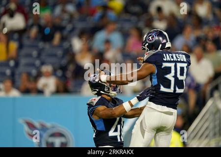 Tennessee Titans safety Matthew Jackson (39) enters the field at U.S Bank  Stadium during the opening ceremonies before an NFL preseason football game  Saturday, Aug. 19, 2023 in Minneapolis. Tennessee won 24-16. (