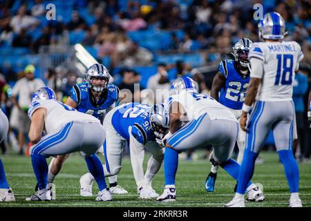 Detroit Lions quarterback Adrian Martinez (18) keeps the ball