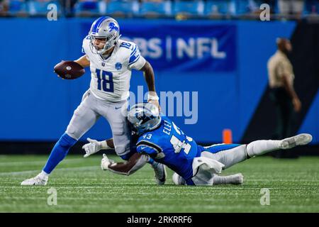 Detroit Lions quarterback Adrian Martinez works on a drill during