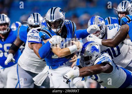 August 25, 2023: Carolina Panthers quarterback Jake Luton (16) is sacked by Detroit Lions defensive tackle Christian Covington (52) and safety Brian Branch (32) during the fourth quarter of the NFL matchup in Charlotte, NC. (Scott Kinser/Cal Sport Media) Stock Photo