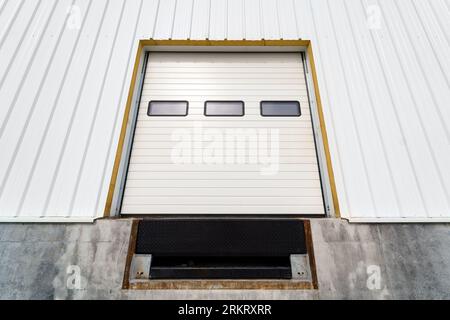 Warehouse gate for loading and unloading cargo in a distributed center Stock Photo