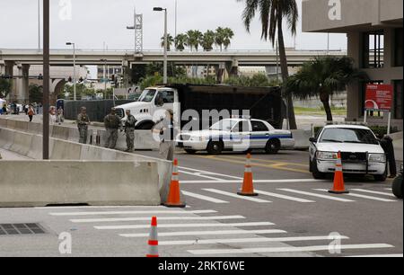 Bildnummer: 58388994  Datum: 26.08.2012  Copyright: imago/Xinhua (120826) -- TAMPA, Aug. 26, 2012 (Xinhua) -- Policemen and soldiers of the U.S. National Guard patrol near the venue of the Republican National Convention in Tampa, Florida, the United States, Aug. 26, 2012. The 2012 Republican National Convention will be held at the Tampa Bay Times Forum in Tampa from Monday to Thursday. Nearly 50,000 visitors are expected to come to the Tampa Bay area for the event, including delegates, journalists and other guests, while thousands of protesters are also said to come along. (Xinhua/Fang Zhe) U. Stock Photo