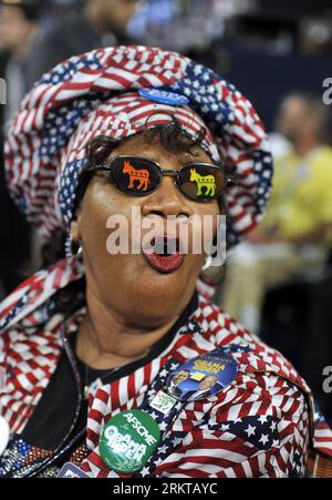 Bildnummer: 58431226  Datum: 04.09.2012  Copyright: imago/Xinhua (120905) -- CHARLOTTE, Sep. 5, 2012 (Xinhua) -- A delegate attends the opening of the Democratic National Convention (DNC) at the Time Warner Cable Arena in Charlotte, North Carolina, the United States, Sept. 4, 2012. The U.S. Democratic Party on Tuesday kicked off its 2012 National Convention in Charlotte, North Carolina, which will nominate President Barack Obama as the party s presidential candidate. (Xinhua/Zhang Jun) (srb) U.S.-CHARLOTTE-DEMOCRATIC CONVENTION PUBLICATIONxNOTxINxCHN Politik Demokraten USA Wahlkampf Parteitag Stock Photo