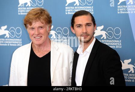 (120906) -- VENICE, Sept. 6, 2012 (Xinhua) -- U.S. filmmaker Robert Redford (L) and actor Shia LaBeouf pose at the photocall for the film The Company You Keep at the 69th Venice International Film Festival in Venice, Italy, Sept. 6, 2012. (Xinhua/Wang Qingqin) (msq) ITALY-VENICE-FILM FESTIVAL- THE COMPANY YOU KEEP PUBLICATIONxNOTxINxCHN   120906 Venice Sept 6 2012 XINHUA U S Filmmaker Robert Redford l and Actor Shia LaBeouf Pose AT The photo call for The Film The Company You keep AT The 69th Venice International Film Festival in Venice Italy Sept 6 2012 XINHUA Wang Qingqin msq Italy Venice Fil Stock Photo