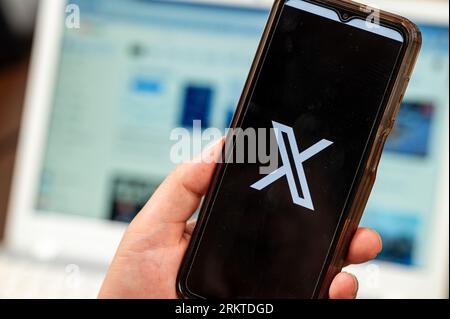Seoul, South Korea -August, 2023 : New Twitter X app. X application icon on smartphone screen. Stock Photo