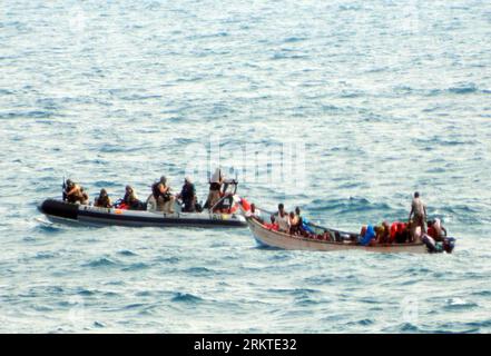 Bildnummer: 58456755  Datum: 10.09.2012  Copyright: imago/Xinhua (120911) -- GULF OF ADEN, Sept. 11, 2012 (Xinhua) -- Crew members of Spanish Armada Vessel Relampago rescue 68 who were drifting in a small boat, at the Gulf of Aden, the Indian Ocean, on Sept. 10, 2012. The Relampago participates in the Atalanta operation of the European Union against piracy in nearby waters of Somalia since Aug. 17, 2012. (Xinhua/AGENCIAPUNTOPRESS)(ctt) INDIAN OCEAN-GULF OF ADEN-MILITARY-RESCUE PUBLICATIONxNOTxINxCHN Gesellschaft Immigranten Flüchtlinge Afrika Afrikaner Migranten Immigration Nigration Rettung M Stock Photo