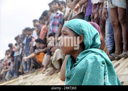 Bildnummer: 58493764  Datum: 20.09.2012  Copyright: imago/Xinhua (120920) -- DHAKA, Sept. 20, 2012 (Xinhua) -- A woman cries over a fire accident in slums at the Begunbari area in Dhaka, capital of Bangladesh, Sept. 20, 2012. About 400 shanties were destroyed and 15 were injured in the accident, fire brigade said. (Xinhua/Shariful Islam) (dzl) BANGLADESH-DHAKA-FIRE ACCIDENT PUBLICATIONxNOTxINxCHN Gesellschaft Feuer Brand Zerstörung x0x xdd premiumd 2012 quer      58493764 Date 20 09 2012 Copyright Imago XINHUA  Dhaka Sept 20 2012 XINHUA a Woman cries Over a Fire accident in Slums AT The  Area Stock Photo