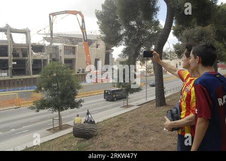 father and son visiting Spotify Camp Nou demolition,  Barcelona football stadium, Stock Photo