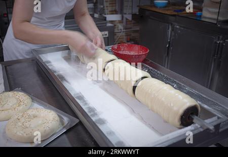 hungarian rolls on a spit sprinkled with sugar Stock Photo