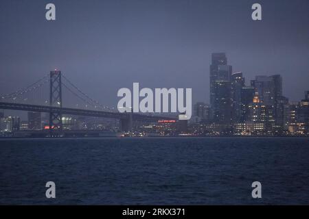 San Francisco, California, USA. 19th Aug, 2023. A general view of San Francisco and Bay Bridge at night. (Credit Image: © Michael Ho Wai Lee/SOPA Images via ZUMA Press Wire) EDITORIAL USAGE ONLY! Not for Commercial USAGE! Stock Photo