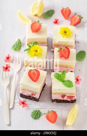 Delicious strawberry sponge cake with berries and lemon. Sponge cake with strawberries. Stock Photo
