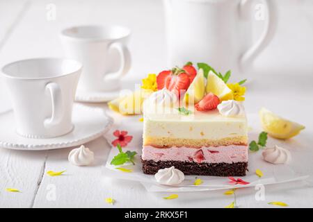 Sweet strawberry sponge cake made of citrus and berry fruits. Summer fruit jelly cake . Stock Photo