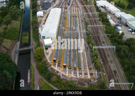 Winson Green, Birmingham, England, August 26th 2023. Parked up and unused West Midlands Railway trains at the Soho train maintenance depot in Birmingham during continued strike action. The industrial action, which is taking place across the country with services including West Midlands Trains, has been timed to coincide with the August Bank Holiday weekend. Pic Credit: Stop Press Media/Alamy Live News Stock Photo