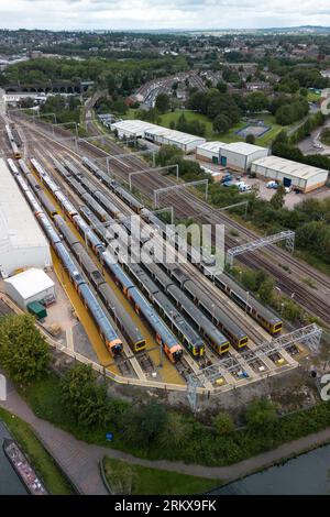 Winson Green, Birmingham, England, August 26th 2023. Parked up and unused West Midlands Railway trains at the Soho train maintenance depot in Birmingham during continued strike action. The industrial action, which is taking place across the country with services including West Midlands Trains, has been timed to coincide with the August Bank Holiday weekend. Pic Credit: Stop Press Media/Alamy Live News Stock Photo