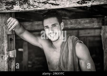 Photo of a man posing with a towel around his neck Stock Photo