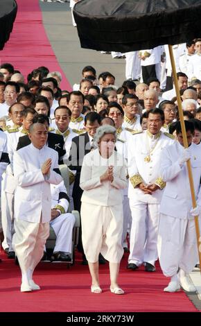 Cambodian King Norodom Sihamoni is carried to the Royal Palace Friday ...