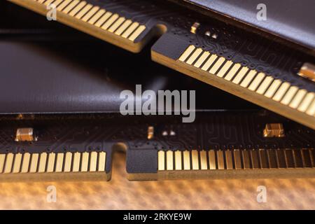 DDR4 DRAM memory module golden electrical contact macro. Computer RAM chip close-up. Desktop PC memory Stock Photo