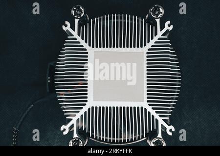 Desktop PC CPU unit cooling radiator with spot for thermal paste, look down close-up, computer hardware electronics details components Stock Photo