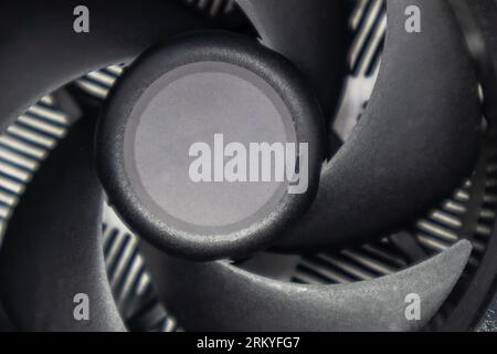 Desktop PC CPU unit cooling radiator close-up. Black cooler fan, PC hardware details. Components from powerful modern personal computer Stock Photo