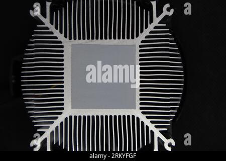 Desktop PC CPU unit cooling system radiator with spot for thermal paste, look down close-up, computer hardware electronics details components Stock Photo