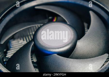 Desktop PC CPU cooling radiator close-up. Black cooler fan, PC hardware details. Components from powerful modern personal computer Stock Photo