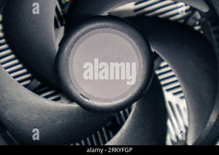 Cooling radiator for desktop PC CPU unit close-up. Black cooler fan, PC hardware details. Components from powerful modern personal computer Stock Photo