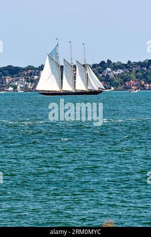 The three masted yacht 'Atlantic' cruising on the Solent off the Isle of Wight on a sunny summers day, Hampshire England UK Stock Photo