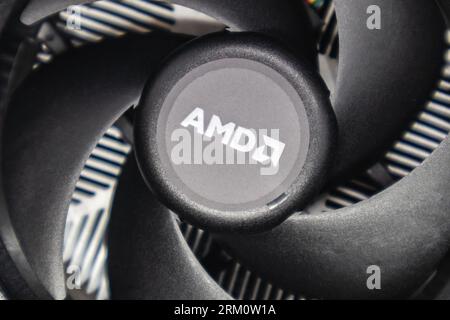 Kyiv, Ukraine - January 05, 2022: AMD cooling radiator for desktop PC CPU unit close-up. Black cooler fan, PC hardware. Components from powerful perso Stock Photo