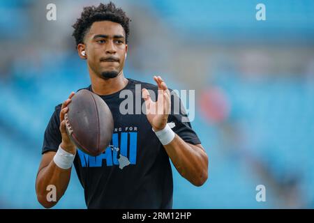 Charlotte, NC, USA: Carolina Panthers quarterback Bryce Young (9) drops back to pass during pregame warmups prior to an NFL preseason game against the Stock Photo