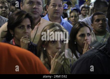 Bildnummer: 59515824  Datum: 14.04.2013  Copyright: imago/Xinhua CARACAS, April 14, 2013 (Xinhua) -- Followers of Venezuelan opposition presidential candidate Henrique Capriles react after the election results were announced in Caracas, capital of Venezuela, on April 14, 2013. Venezuelan acting President Nicolas Maduro narrowly won the presidential election with 50.66 percent of the votes, National Electoral Council s President Tibisay Lucena said on Sunday. (Xinhua/Juan Carlos Hernandez) (py) VENEZUELA-CARACAS-PRESIDENTIAL ELECTION PUBLICATIONxNOTxINxCHN Politik Wahl Präsidentschaftswahl xas Stock Photo