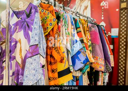 Colorful clothes, colourful female dresses, womens clothes, Capital Mall for Bahraini handmade products, Karbabad, Bahrain Stock Photo