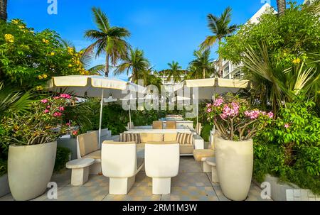 Grand Cayman, Cayman Islands, July 02nd 2023, view of a resting area at Palm Heights, a boutique hotel on Seven Mile Beach Stock Photo